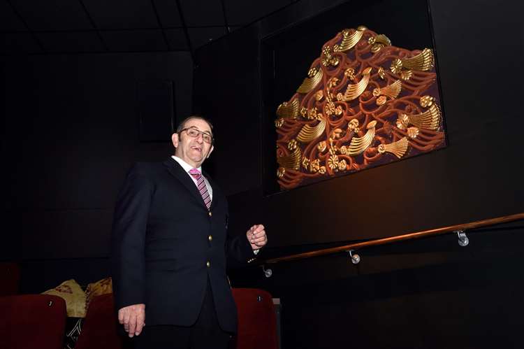 Pat Church and the embossed mural